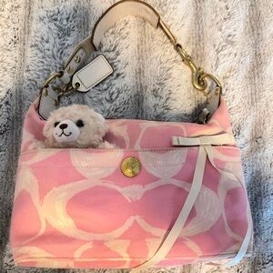 Pink and white vintage coach shoulder bag.